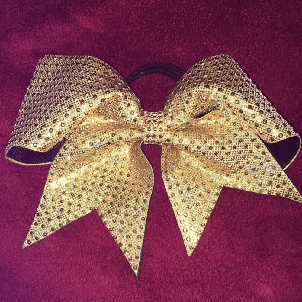 Gold bow ponytail. For pom, dance or cheer